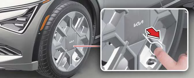 Kia EV6 wheel cover removal using dedicated removal tool